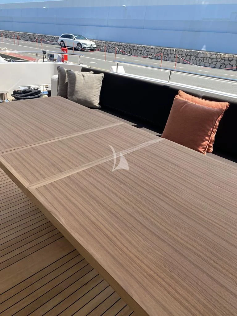 a deck with a car parked on it aboard JOURNEY Yacht for Sale
