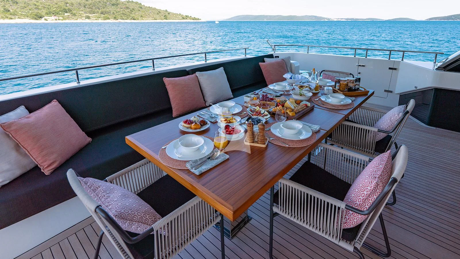a table with food on it aboard JOURNEY Yacht for Sale