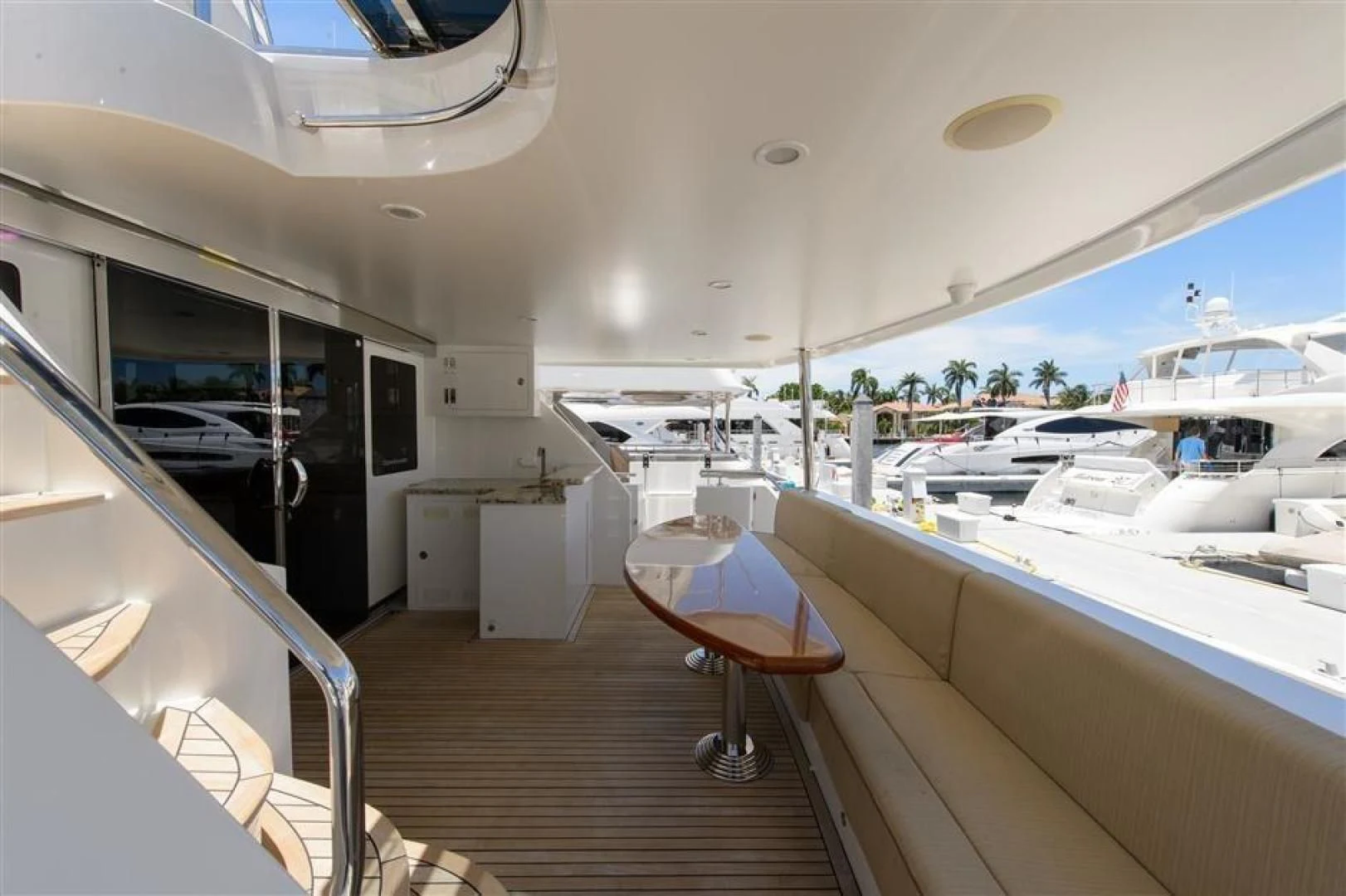 a room with a table and chairs aboard RHONDAVOUS Yacht for Sale