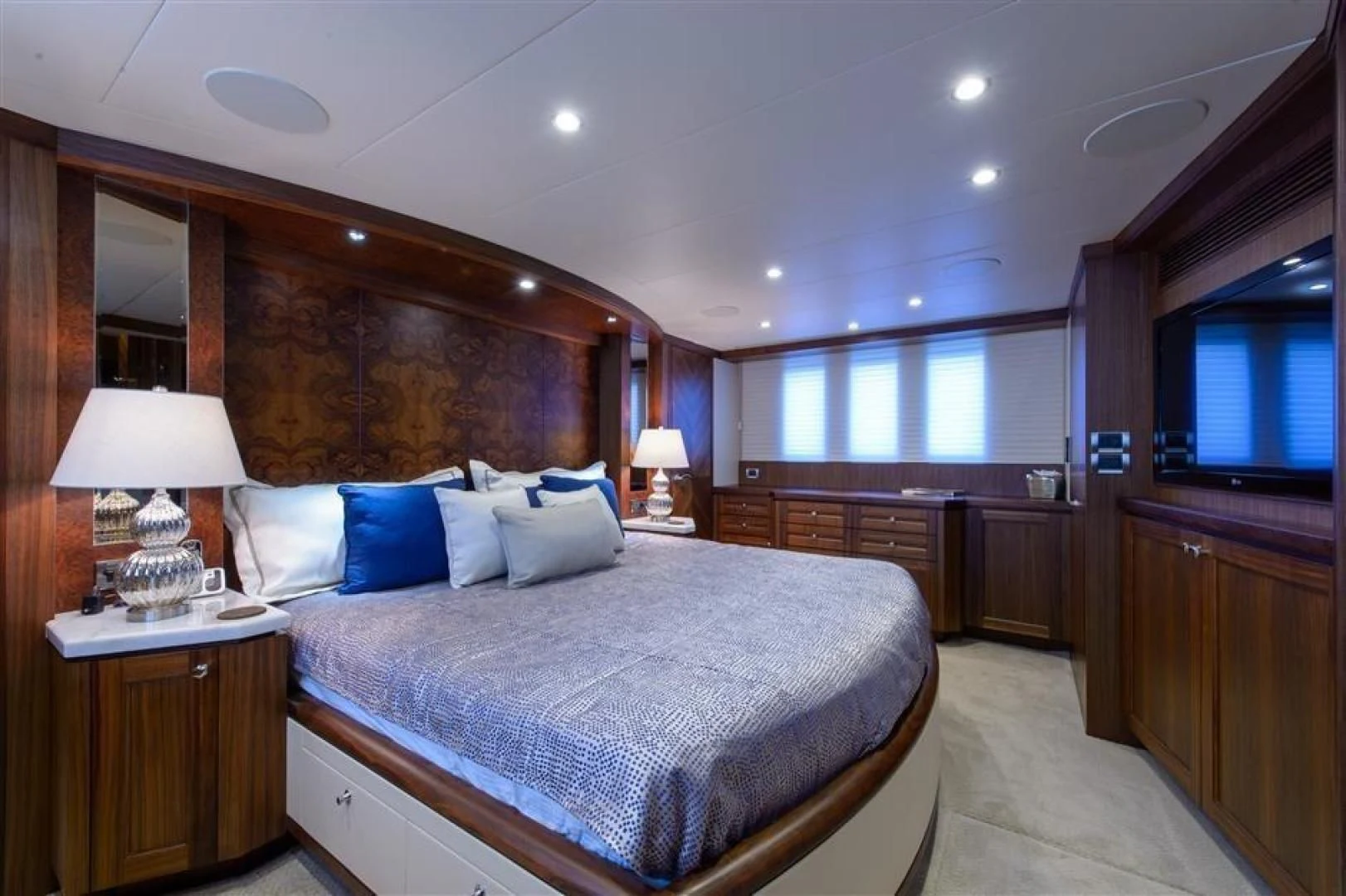 a large bedroom with a large bed aboard RHONDAVOUS Yacht for Sale