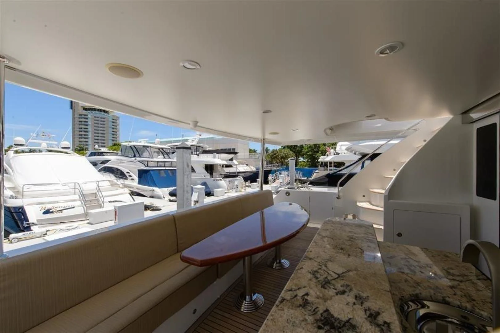 a room with a table and chairs aboard RHONDAVOUS Yacht for Sale