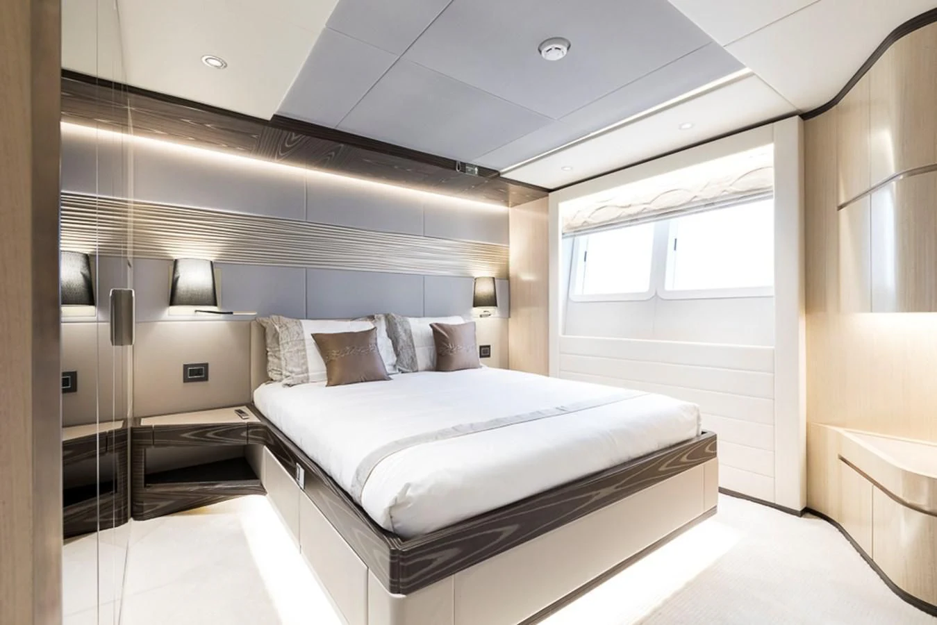 a bed in a room aboard MAJESTY 100 Yacht for Sale