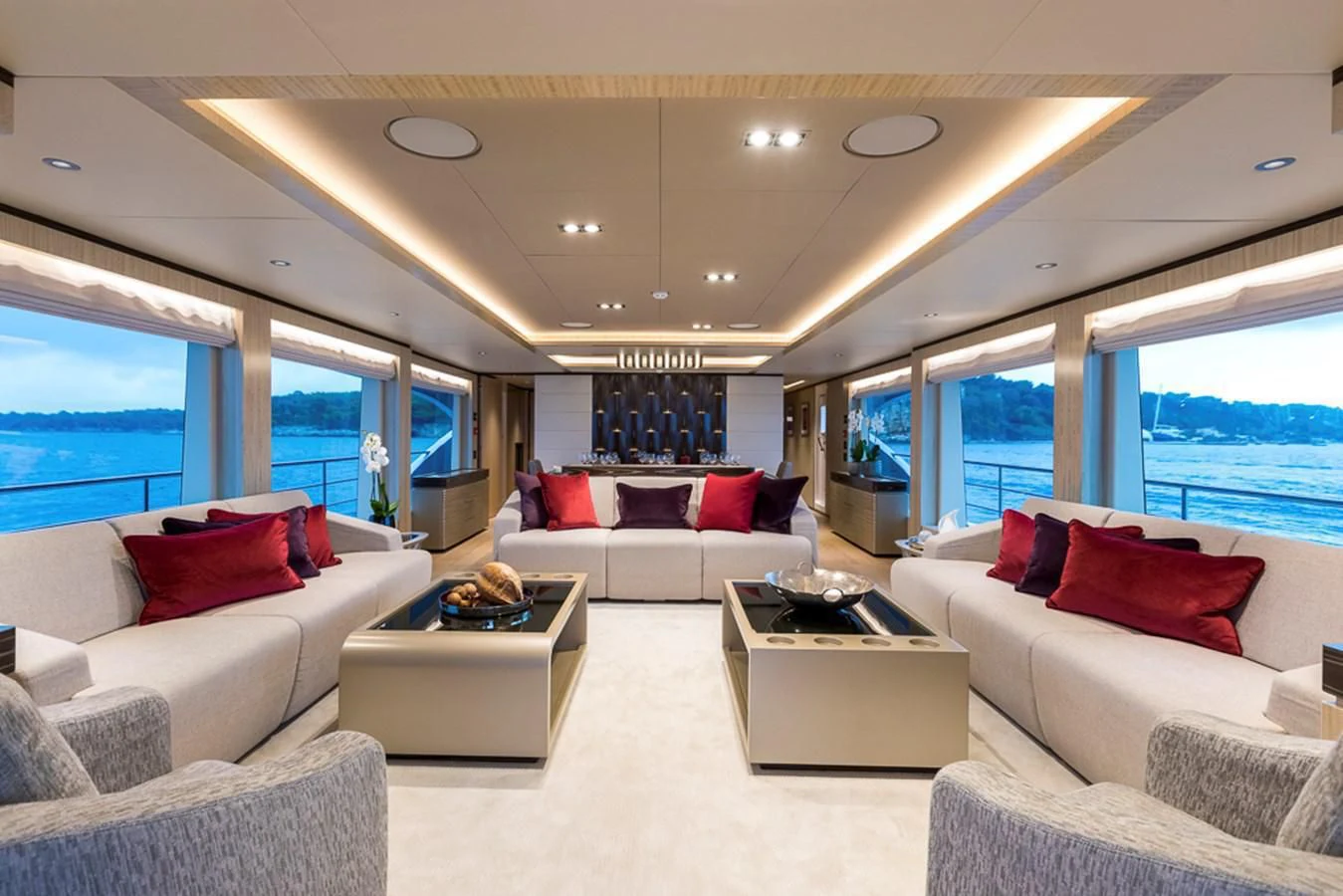 a living room with a large window aboard MAJESTY 100 Yacht for Sale