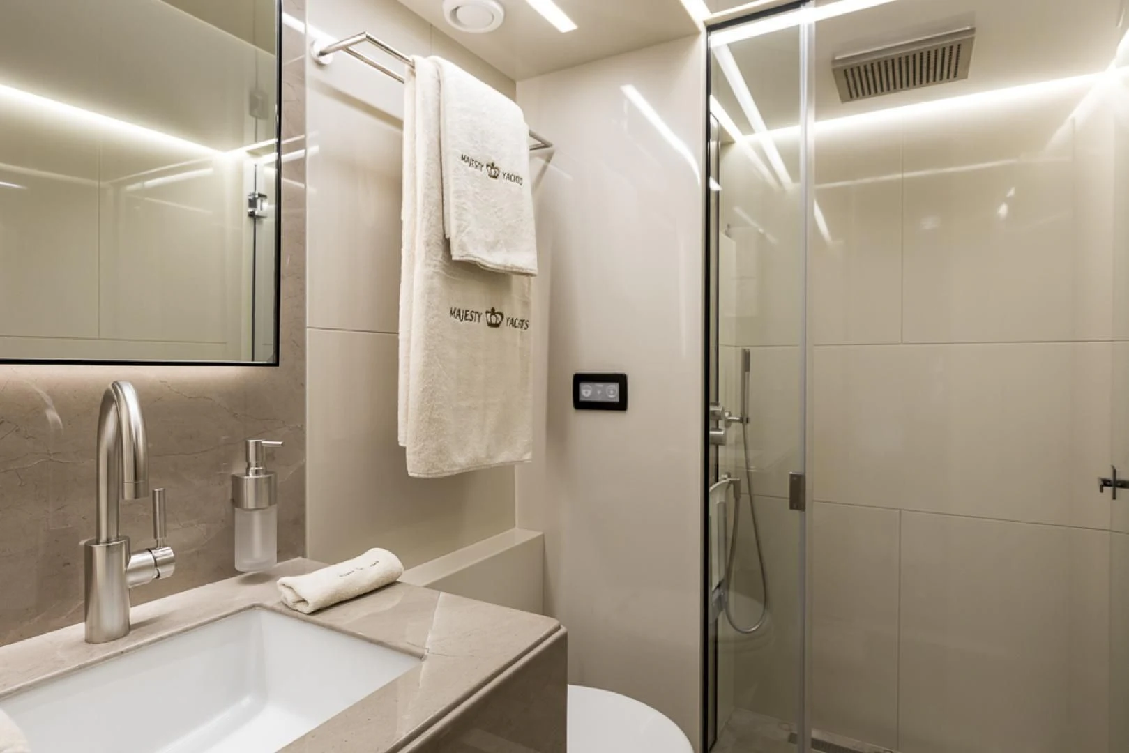 a bathroom with a shower unit and sink aboard MAJESTY 100 Yacht for Sale