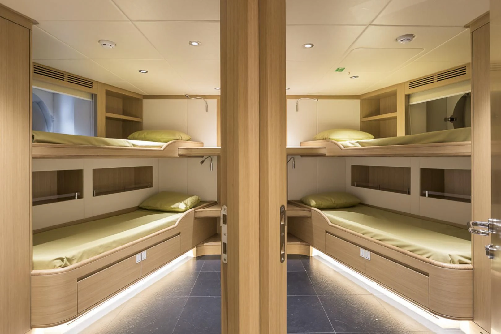a room with bunk beds aboard MAJESTY 100 Yacht for Sale