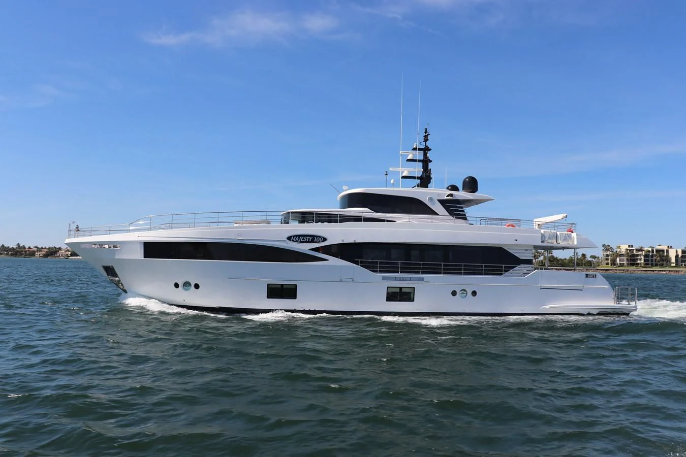 a white yacht on the water aboard MAJESTY 100 Yacht for Sale