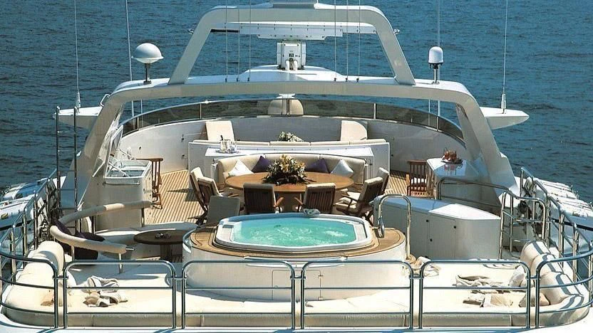 a large swimming pool on a boat aboard MORE Yacht for Sale
