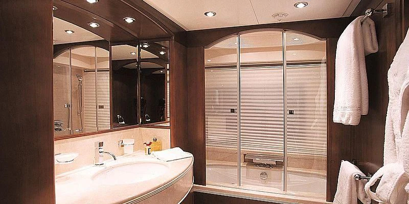 a bathroom with a large shower unit aboard MORE Yacht for Sale