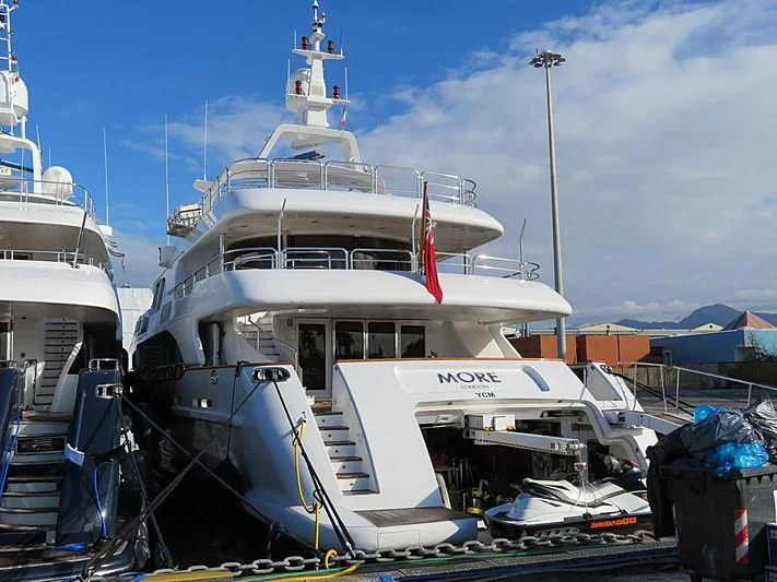 a couple of boats are parked aboard MORE Yacht for Sale