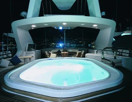 a large indoor swimming pool aboard MORE Yacht for Sale