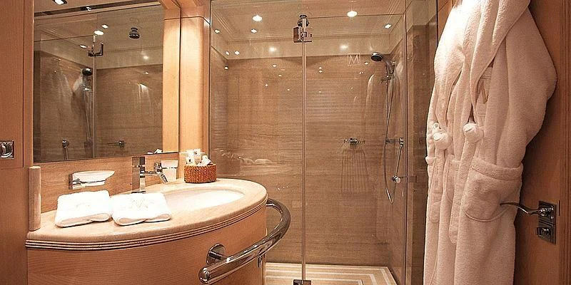 a bathroom with a sink and a shower aboard MORE Yacht for Sale