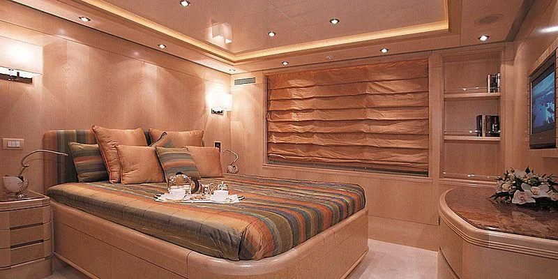 a bed in a room aboard MORE Yacht for Sale