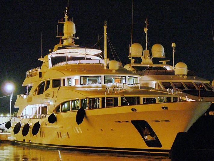 a yellow and white boat aboard MORE Yacht for Sale