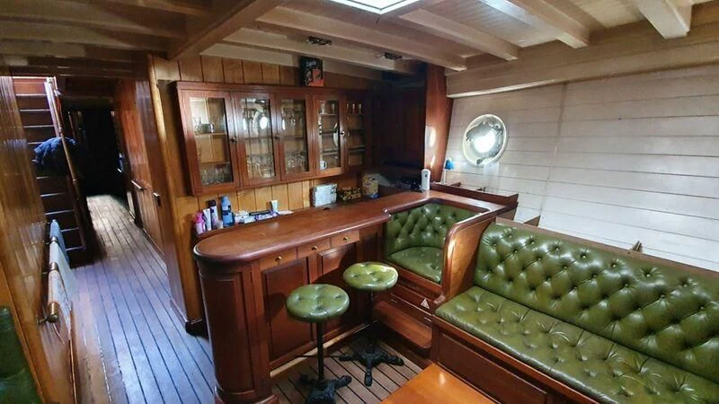 a kitchen with a bar and a bar aboard ZACA A TE MOANA Yacht for Sale