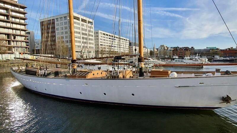 a large ship in a harbor aboard ZACA A TE MOANA Yacht for Sale