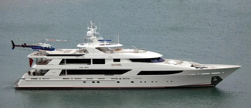a white yacht in the ocean aboard EVVIVA Yacht for Sale