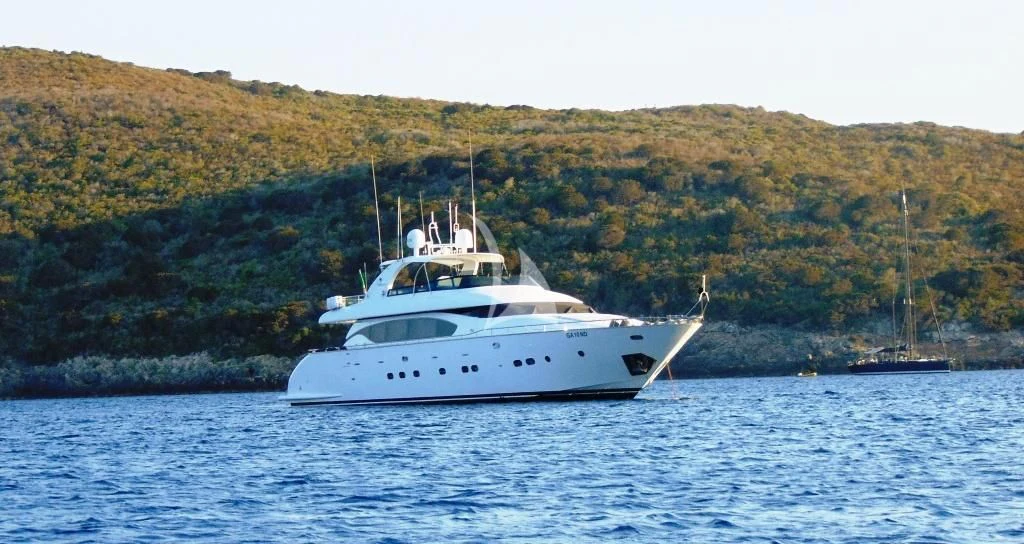 a white yacht on the water aboard WILLFUL Yacht for Sale