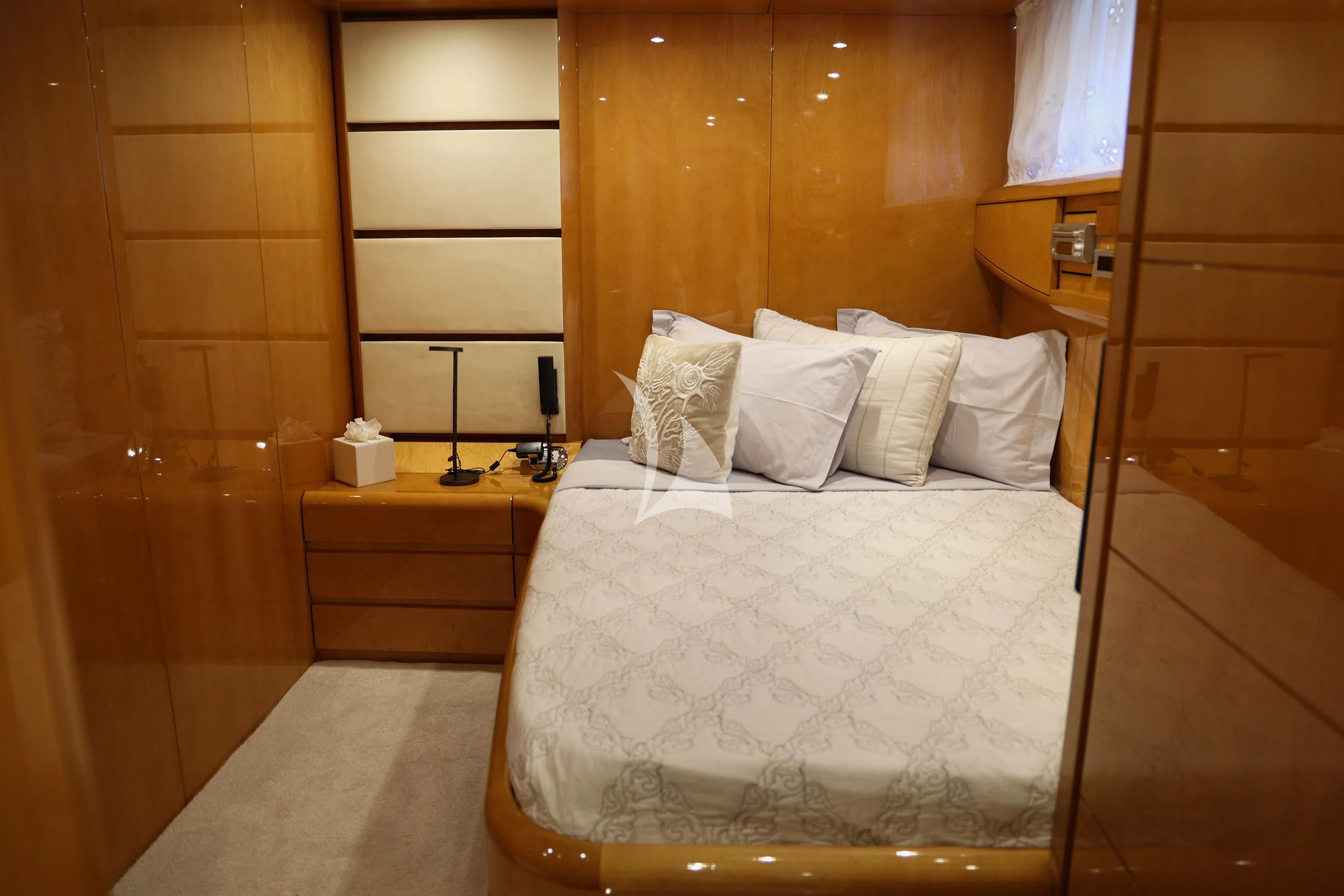 a bed with white sheets aboard WILLFUL Yacht for Sale