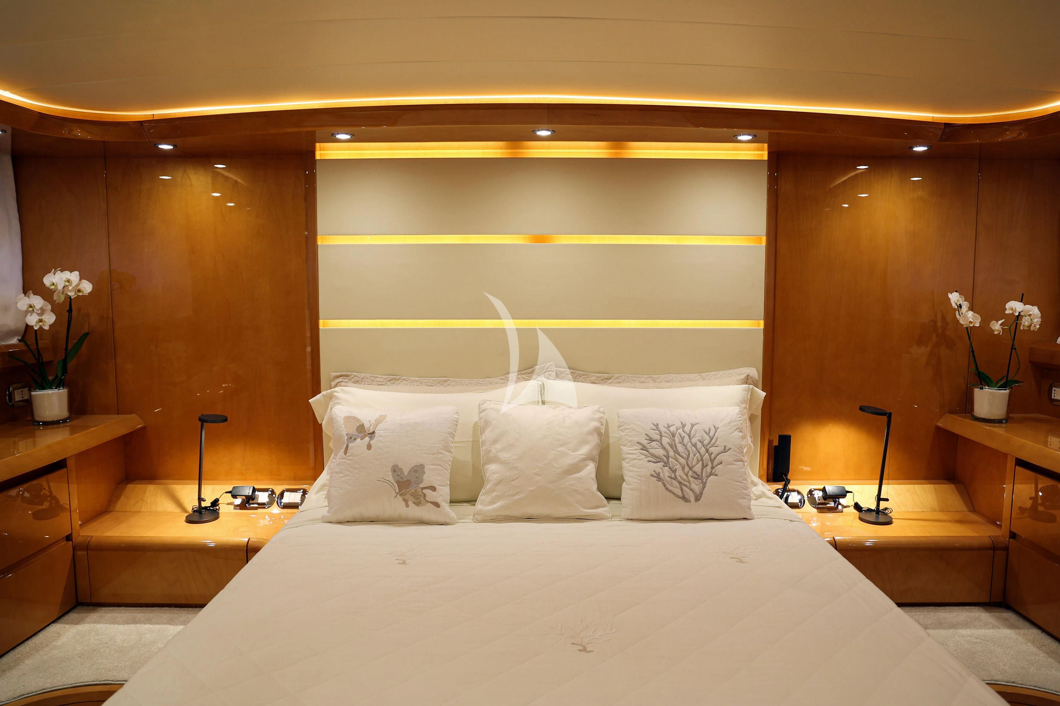 a bed with white sheets aboard WILLFUL Yacht for Sale