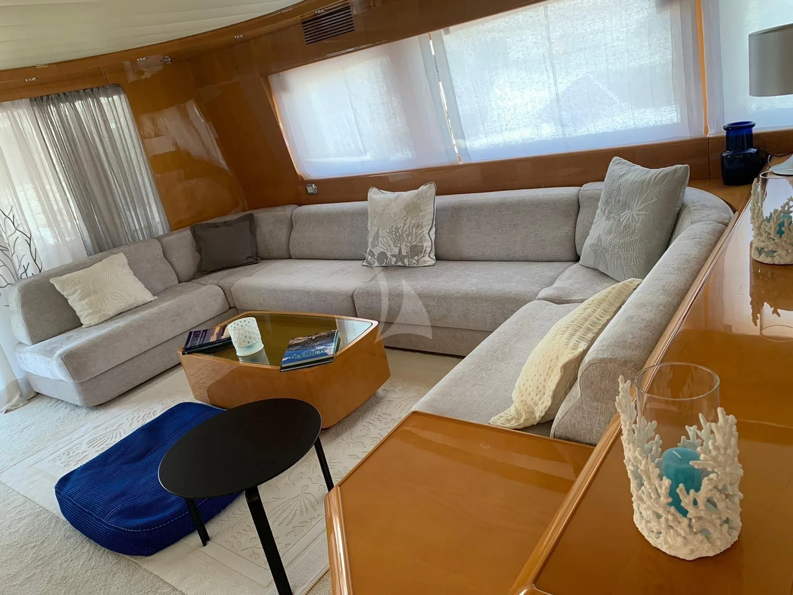 a living room with a couch and a coffee table aboard WILLFUL Yacht for Sale