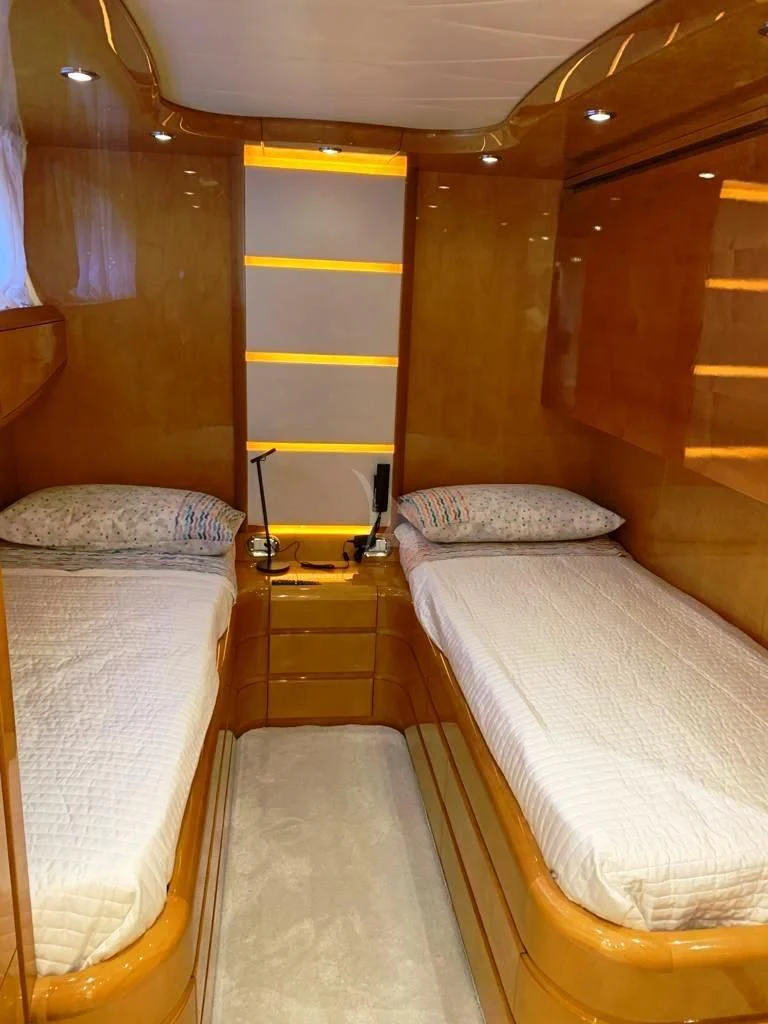 a room with two beds aboard WILLFUL Yacht for Sale