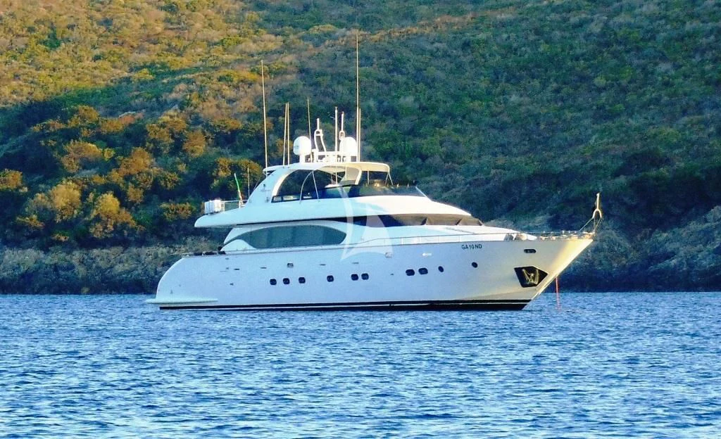 a white yacht on the water aboard WILLFUL Yacht for Sale