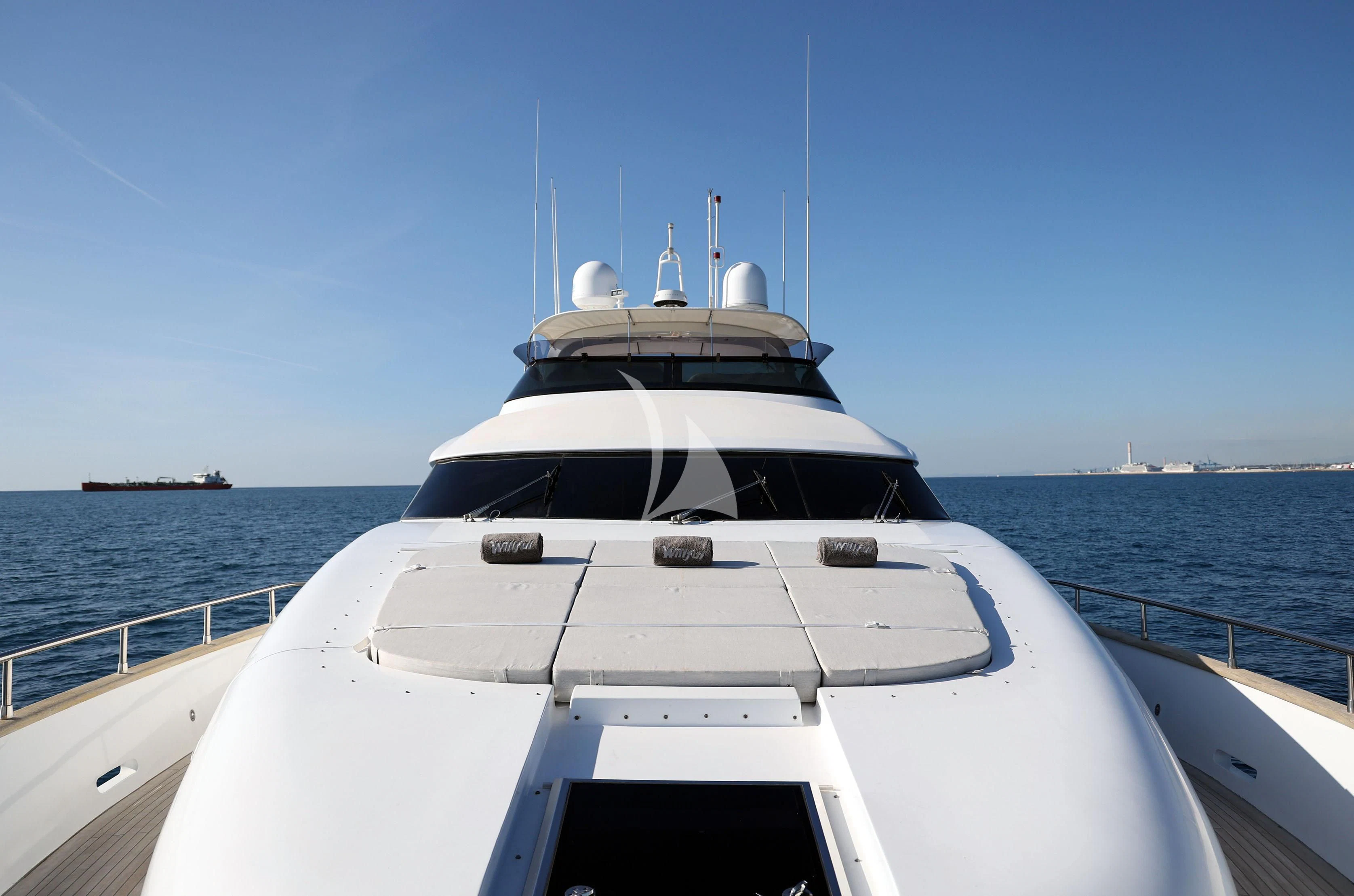 a white boat on the water aboard WILLFUL Yacht for Sale