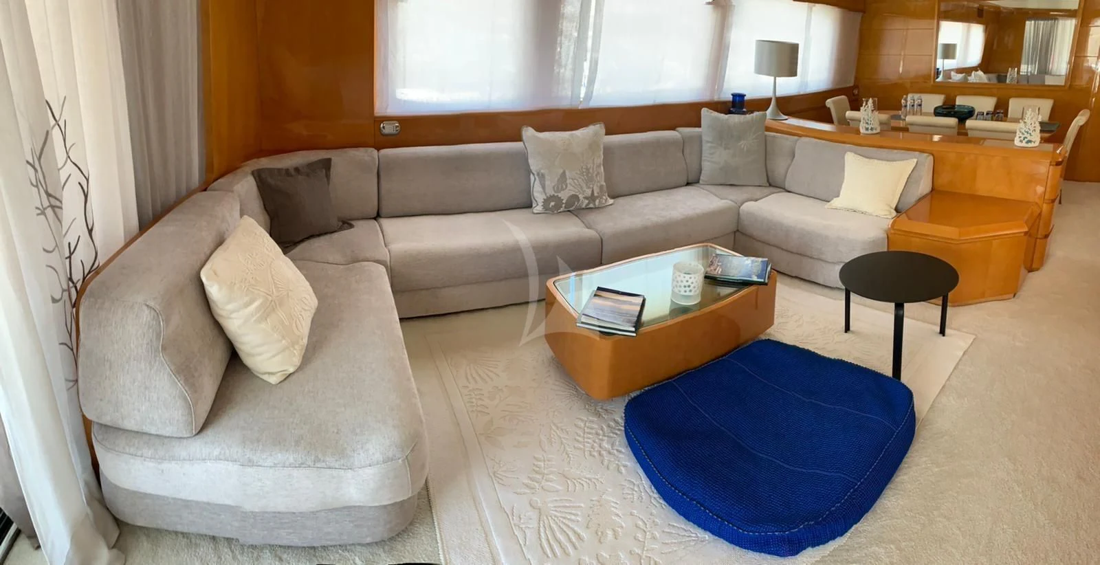 a living room with a couch and a rug aboard WILLFUL Yacht for Sale