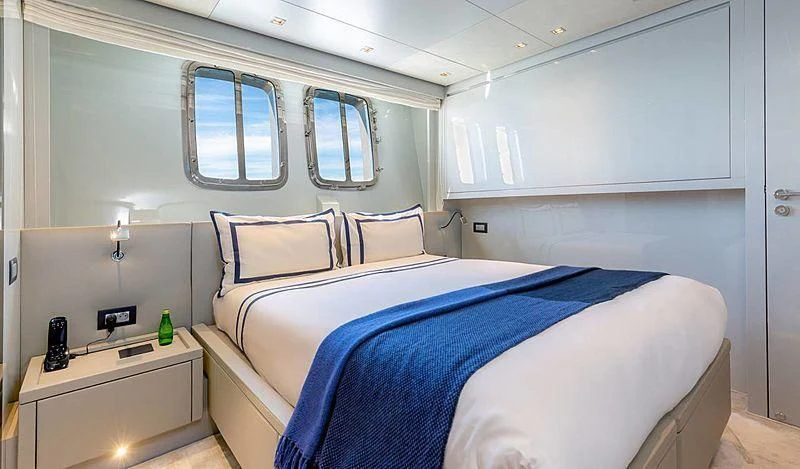 a couple of beds in a room aboard WANDA Yacht for Sale