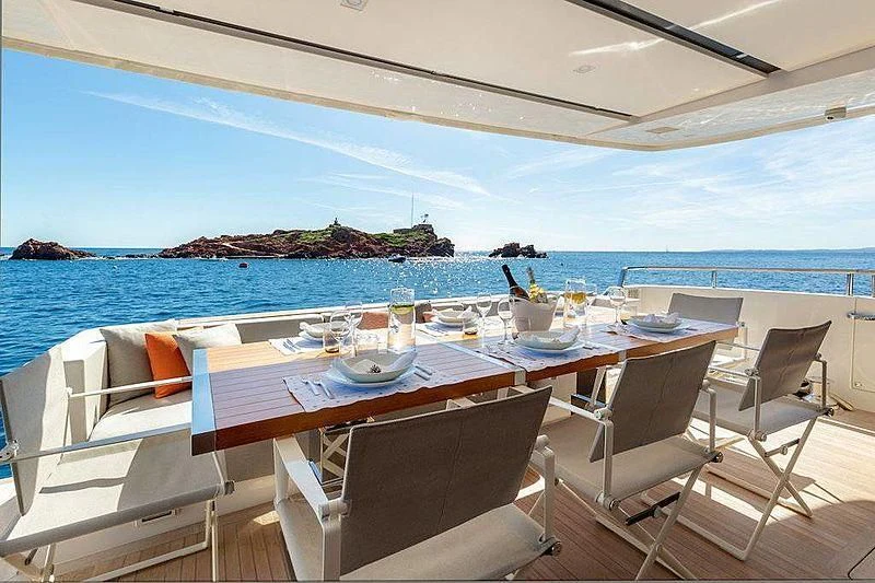 a table set for a meal on a boat aboard WANDA Yacht for Sale