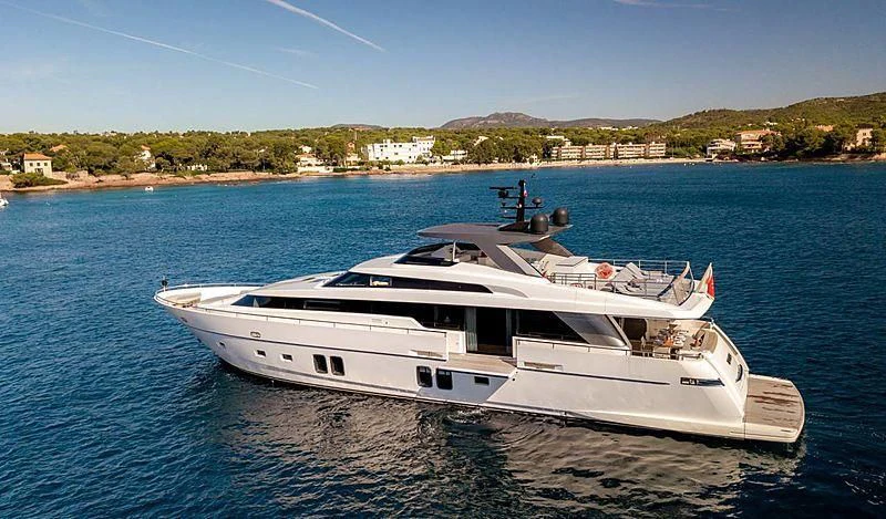 a white boat on the water aboard WANDA Yacht for Sale