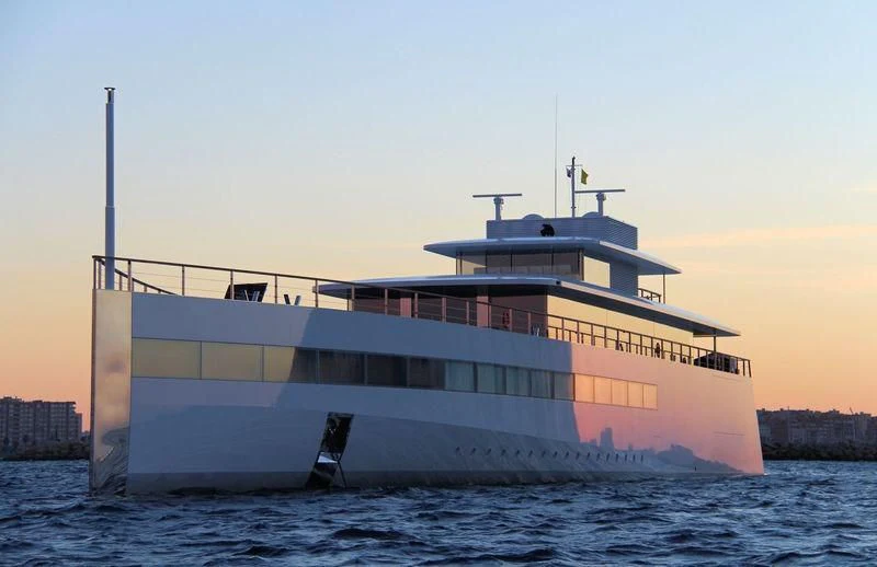 a large white ship in the water aboard VENUS Yacht for Sale