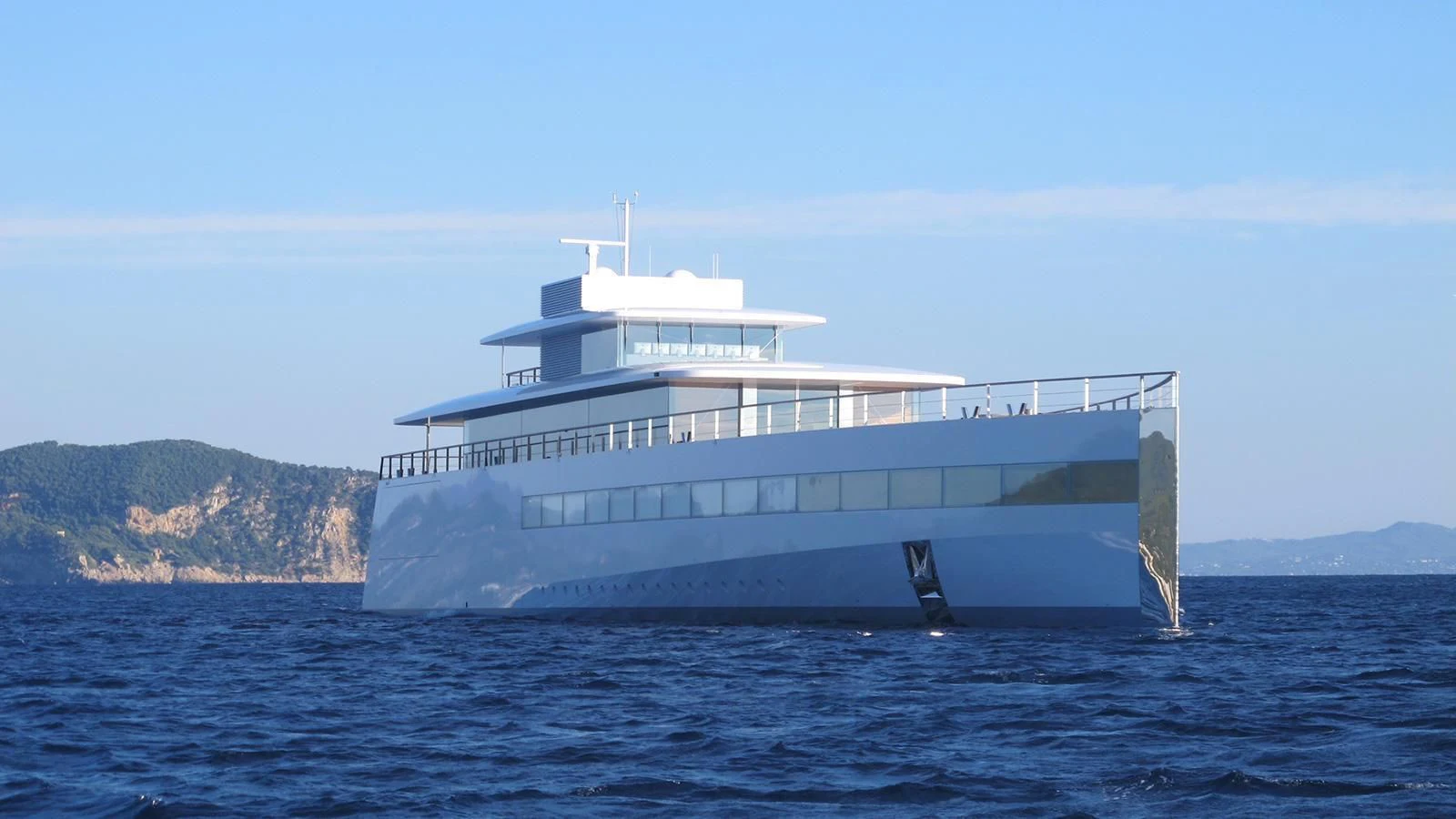 a large white boat in the water aboard VENUS Yacht for Sale