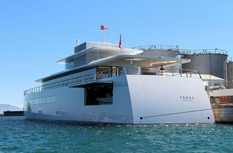 a large white boat in the water aboard VENUS Yacht for Sale