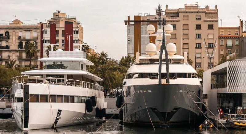 a couple of boats docked aboard VENUS Yacht for Sale
