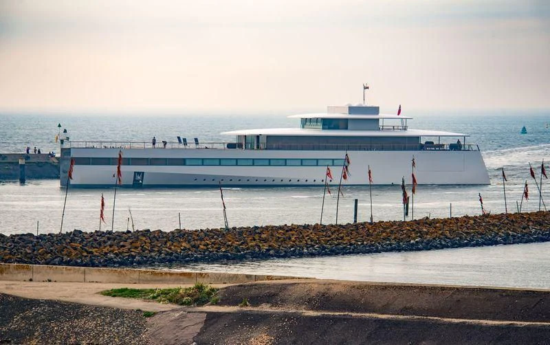 a large cruise ship on a beach aboard VENUS Yacht for Sale