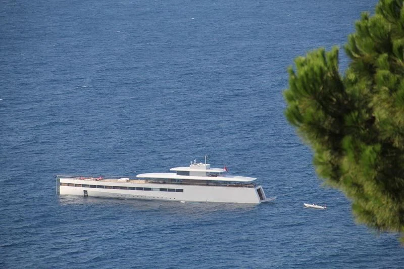 a white boat in the water aboard VENUS Yacht for Sale