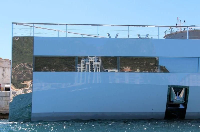 a wall with a building in the background aboard VENUS Yacht for Sale