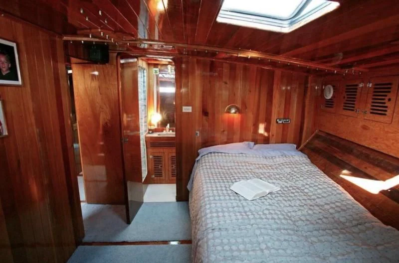 a bed in a cabin aboard CHRISTINE Yacht for Sale