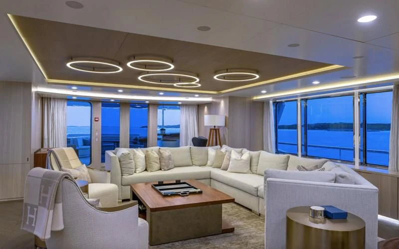 a living room with a large window aboard REVERIE Yacht for Sale