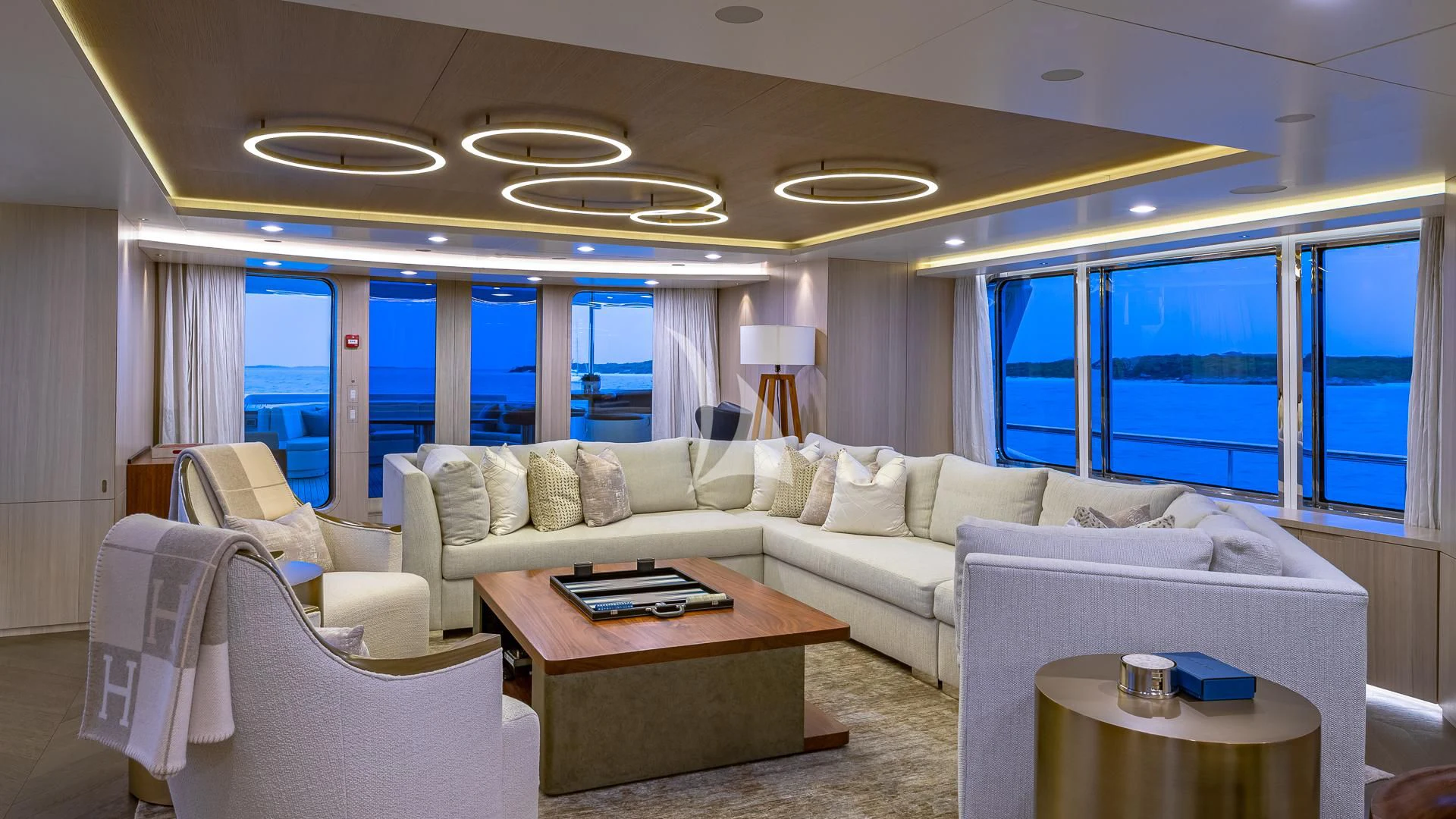 a living room with a large window aboard REVERIE Yacht for Sale