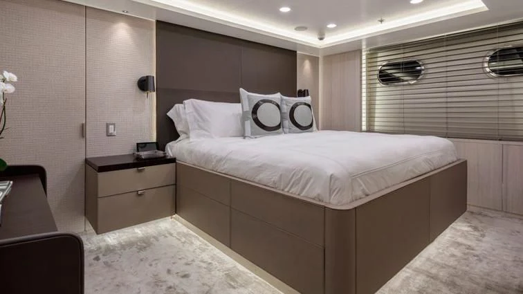 a bed in a room aboard REVERIE Yacht for Sale