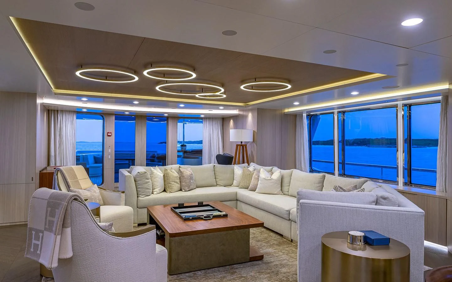 a living room with a large window aboard REVERIE Yacht for Sale