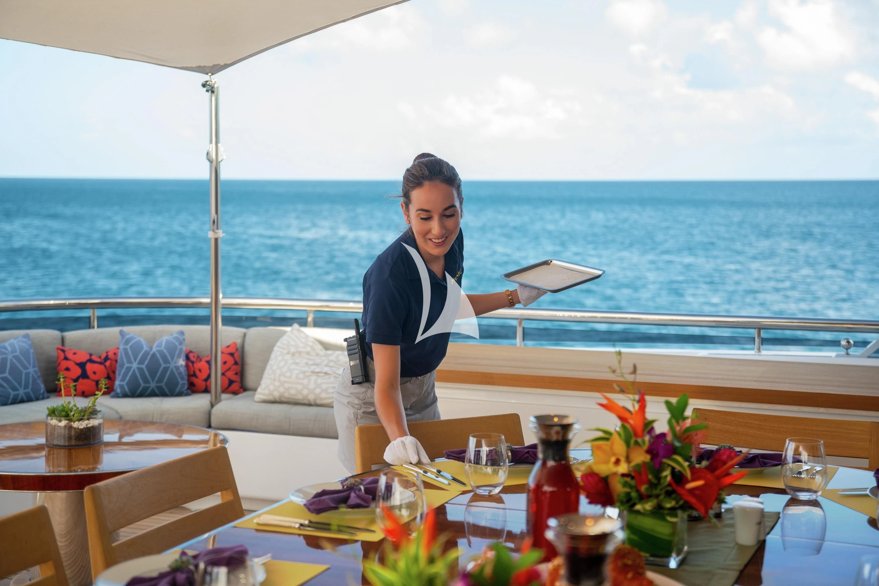 a person standing on a balcony aboard REVERIE Yacht for Sale