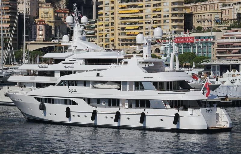 a white yacht in the water aboard REVERIE Yacht for Sale