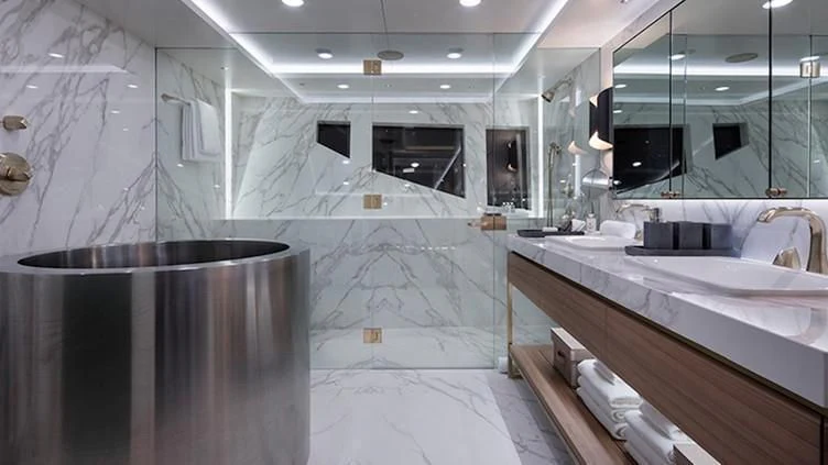a bathroom with a large tub aboard REVERIE Yacht for Sale