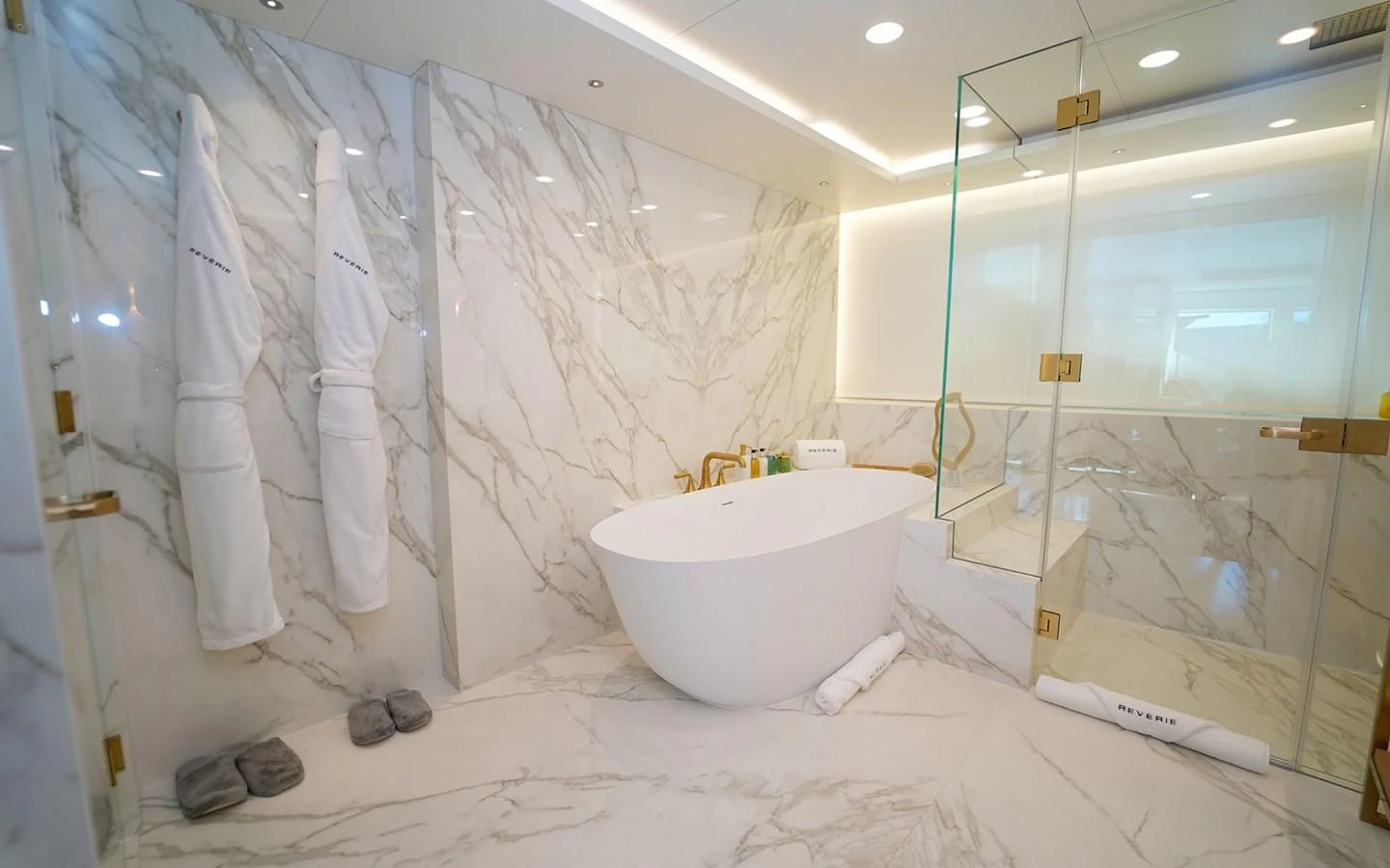 a bathroom with a large bathtub aboard REVERIE Yacht for Sale