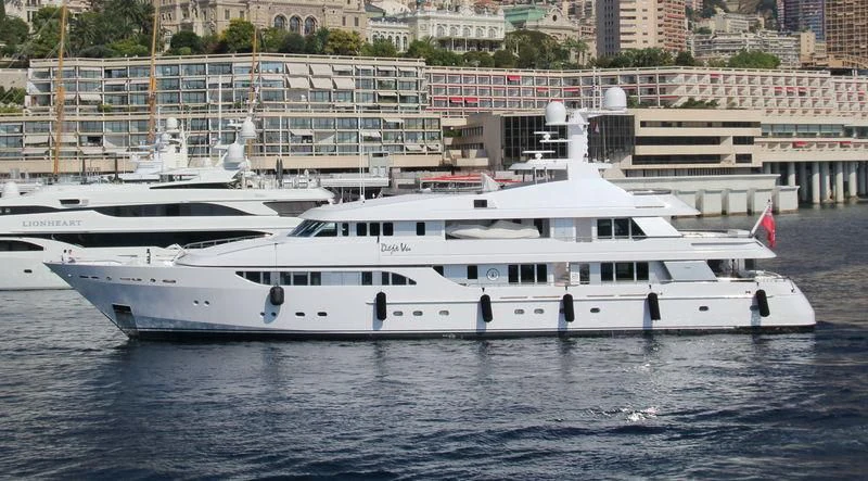 a white yacht in the water aboard REVERIE Yacht for Sale