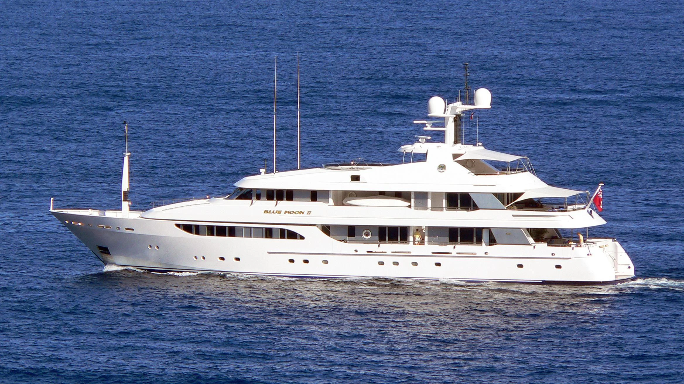 a white yacht in the water aboard REVERIE Yacht for Sale