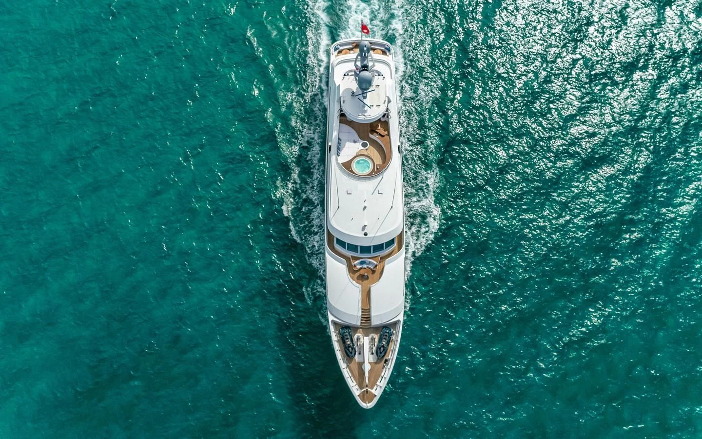 a boat in the water aboard REVERIE Yacht for Sale